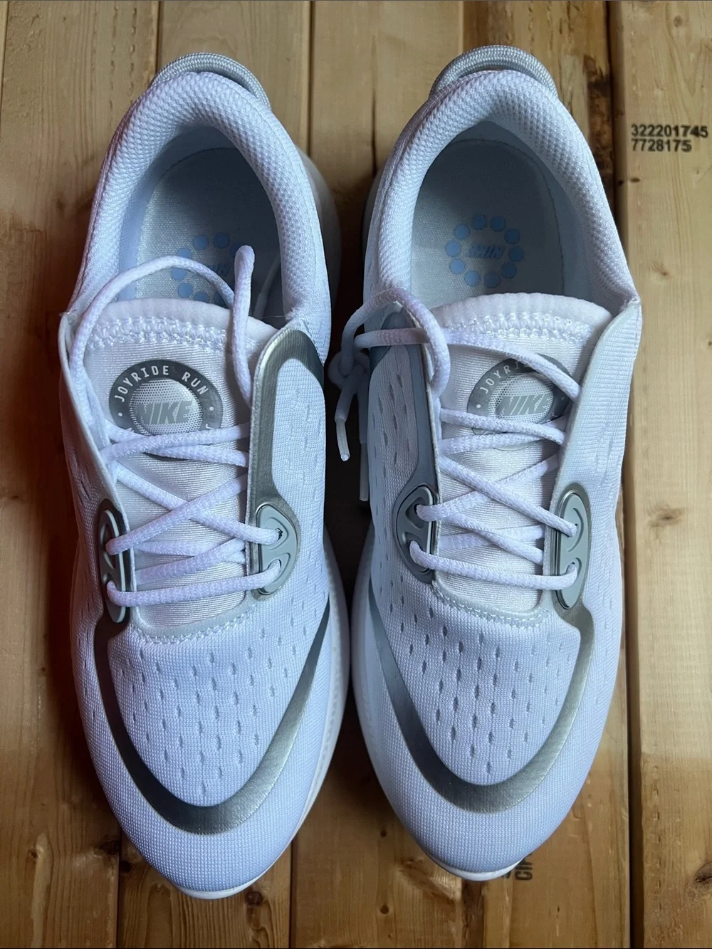 Nike Women’s White with Light Blue Accent Running Shoes